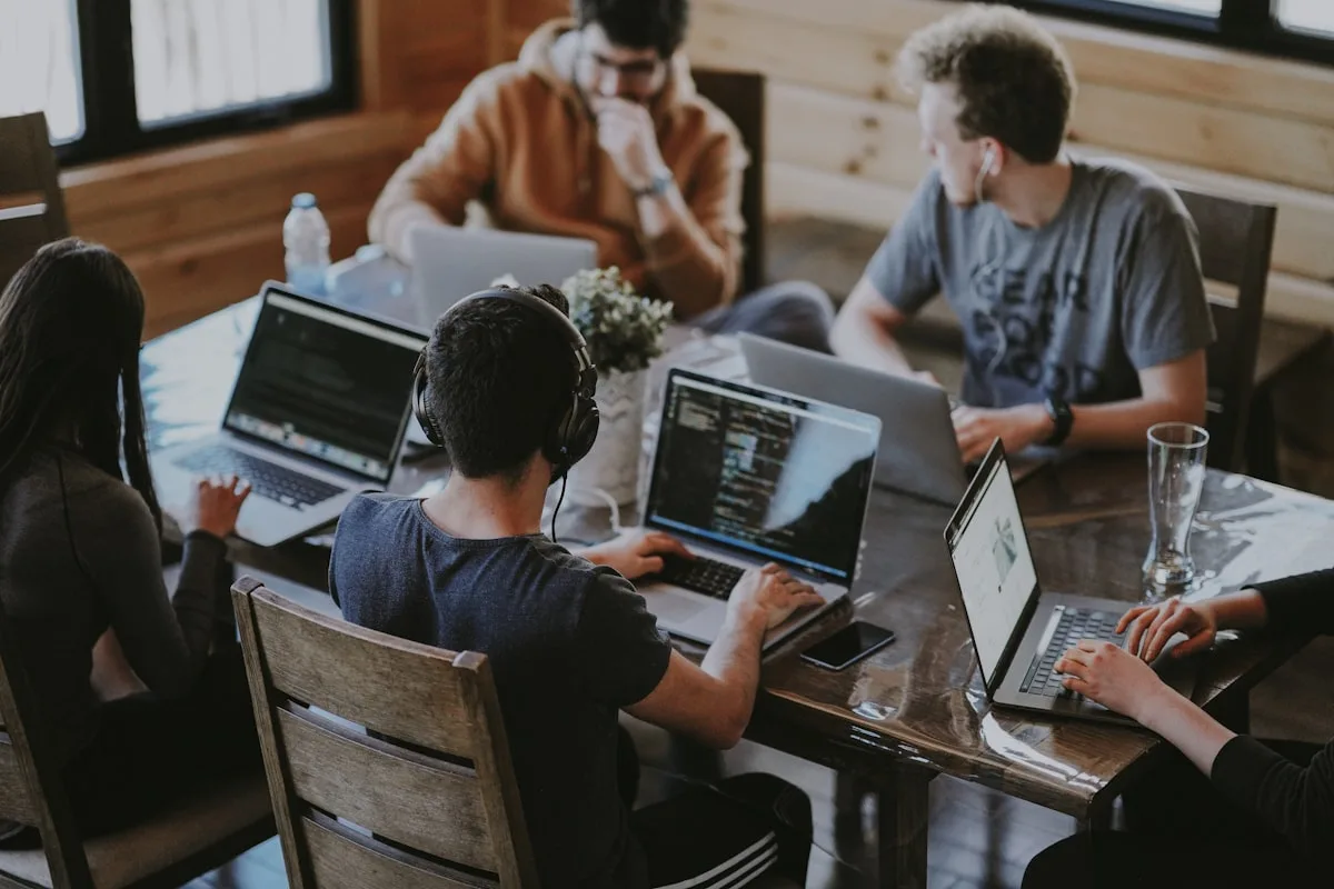 A web development agency team collaborating on a website project
