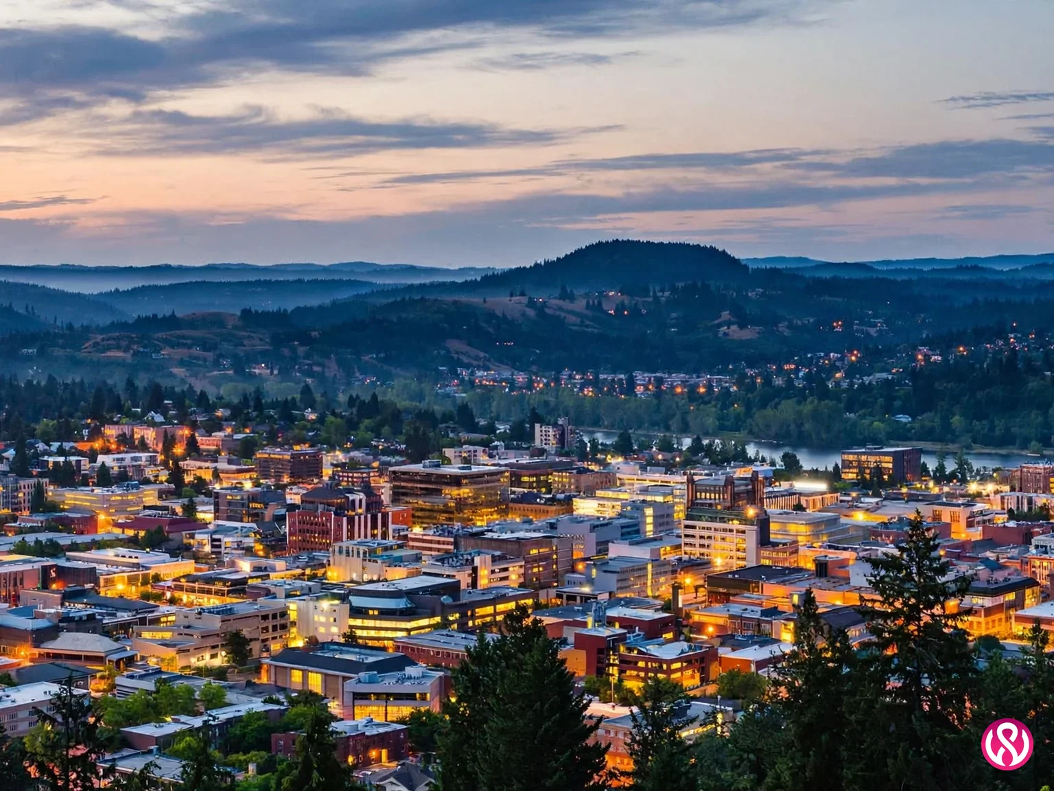 Eugene skyline at dusk, the Track Town market where fixed-price web design undercuts the agency norm