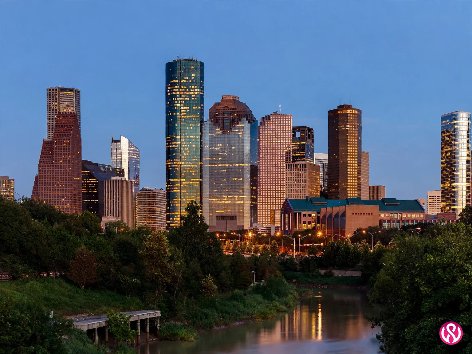 Downtown Houston skyline at dusk, the market where fixed-price web design undercuts the agency norm